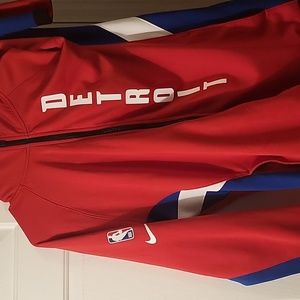 Detroit Pistons jacket.. size XL red fits and very comfortable.